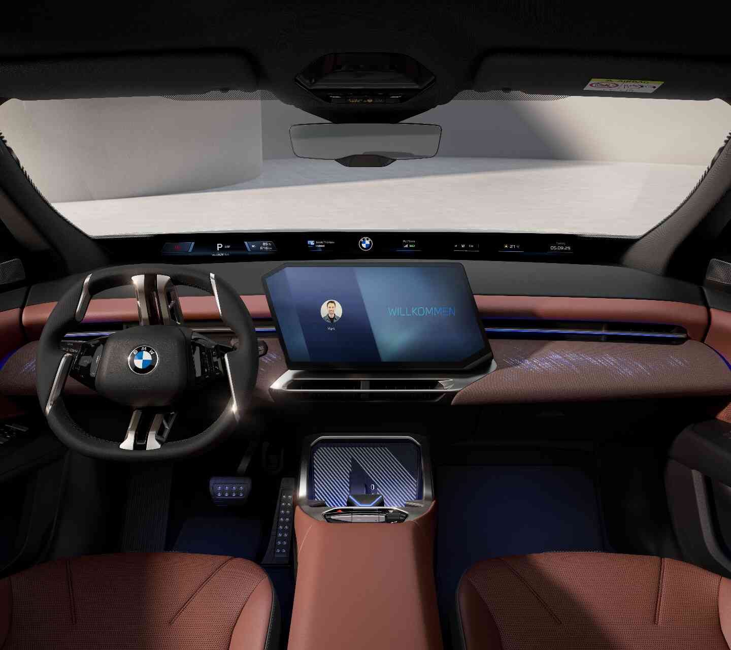 BMW iX 3 Innenraum mit digitalem Armaturenbrett, Touchscreen und stilvollen braunen Sitzen.